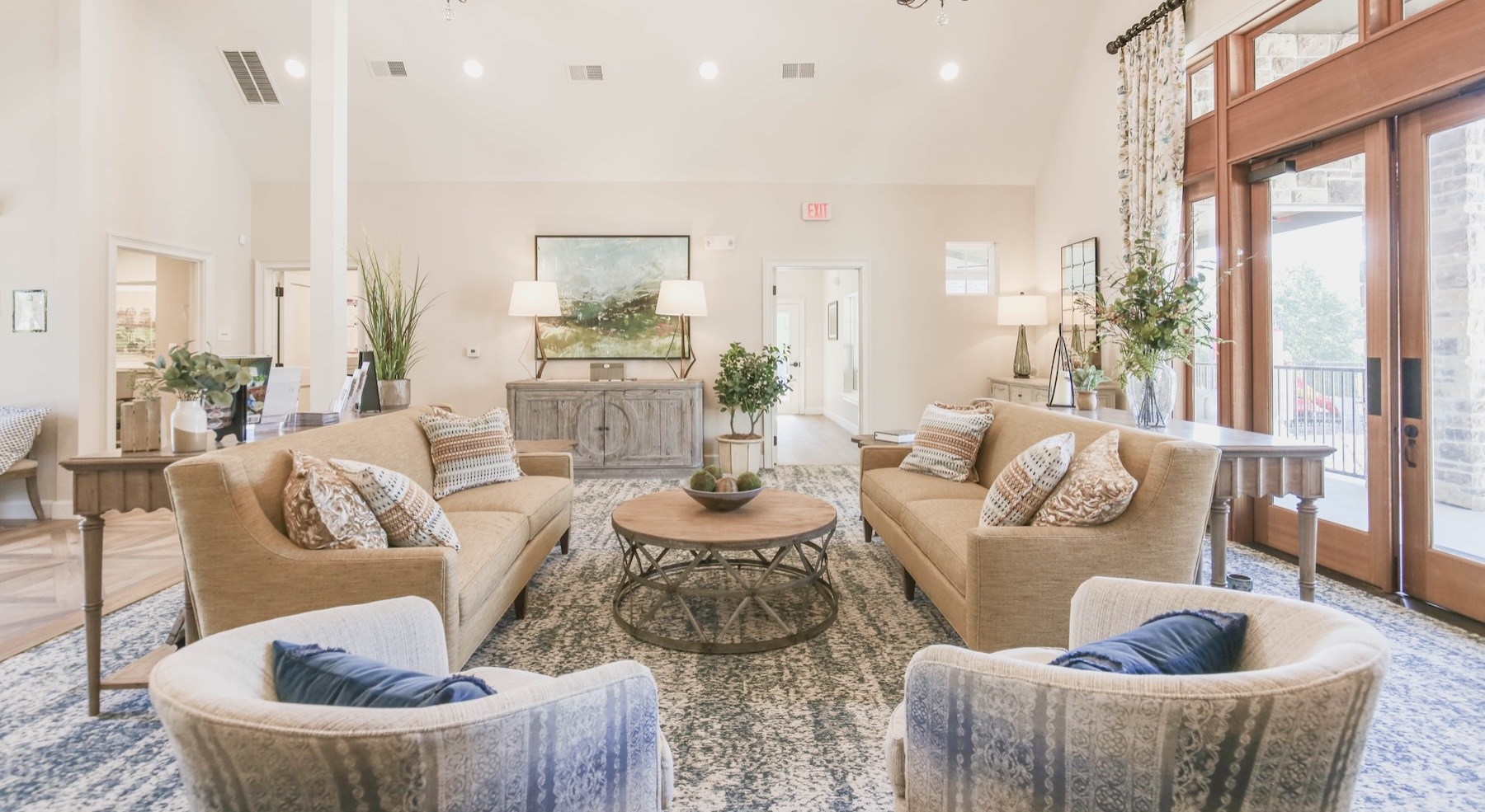 a clubroom with couches and chairs