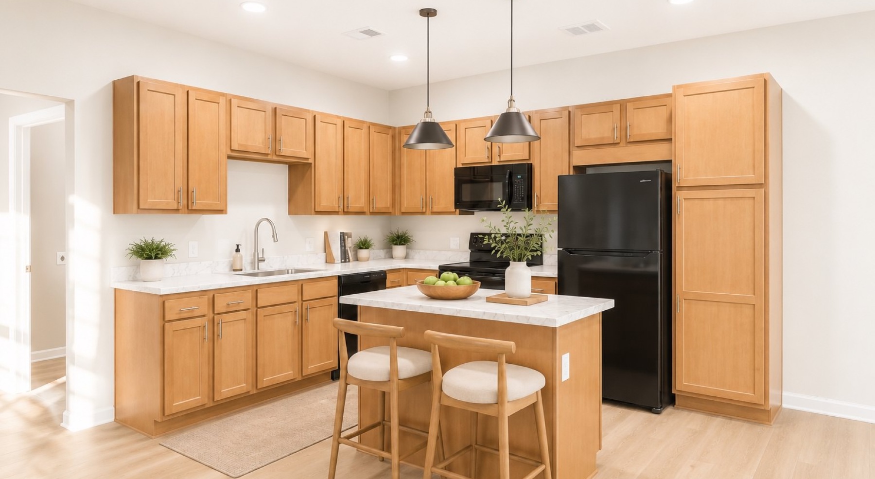 a kitchen with wood cabinets