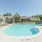 Swimming pool with building in background