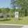 Apartment entrance sign on grass