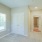 Bedroom with carpet and closet